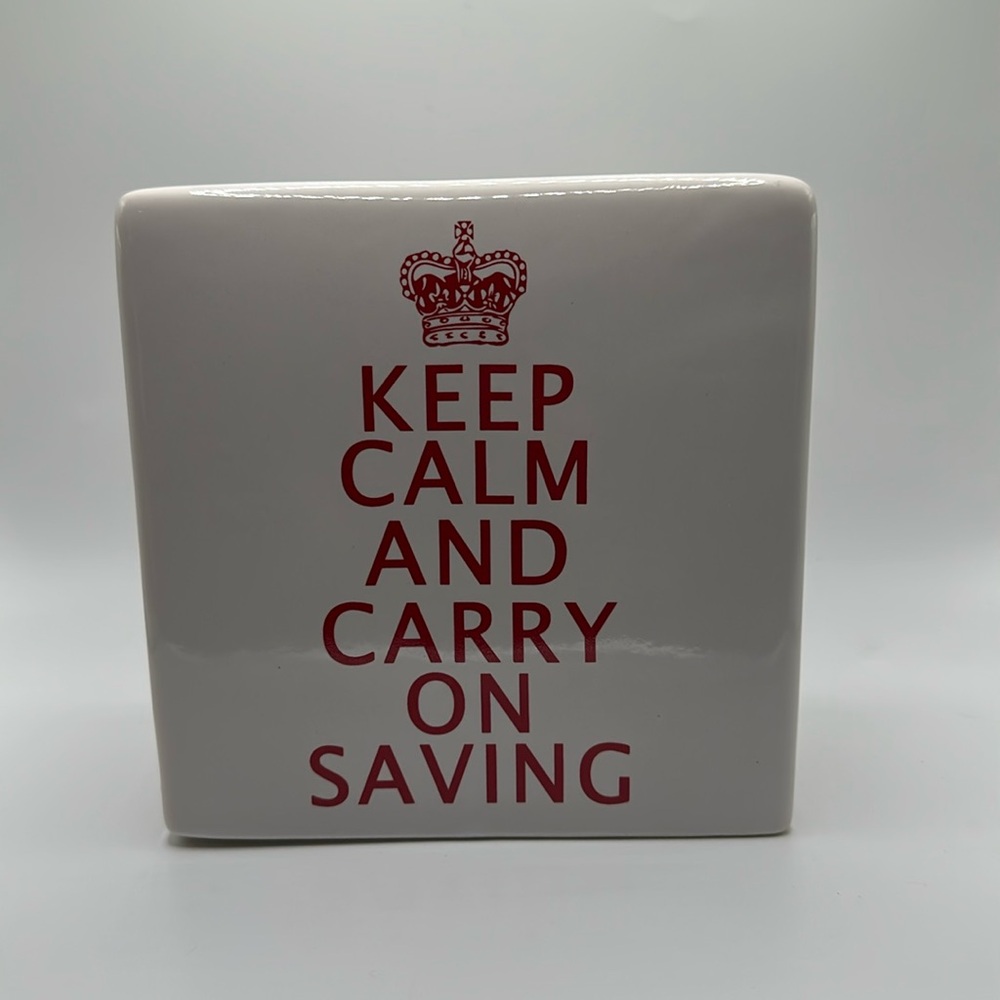 Ceramic keep calm and carry on saving piggy bank with defect